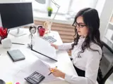 Woman doing Spanish tax returns